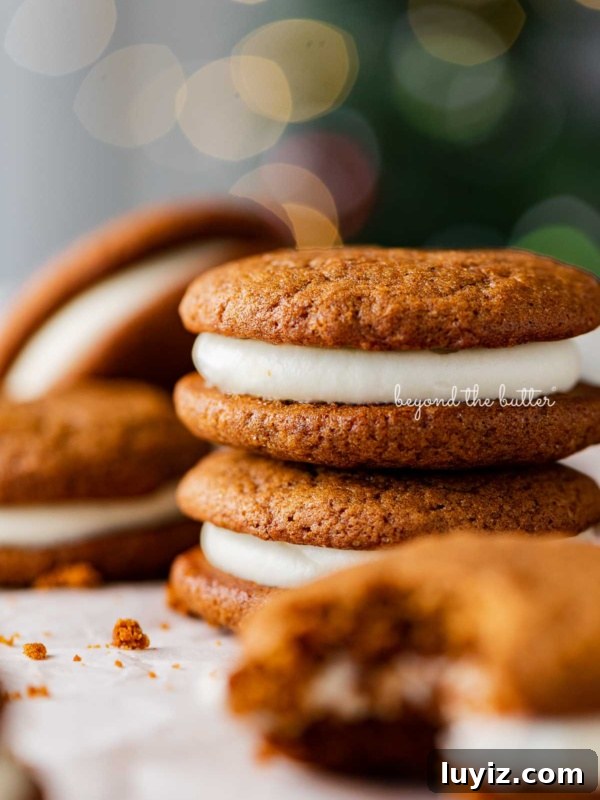Classic Homemade Cherry Pie Recipe for Perfect Crust and Filling 12 Stacked gingerbread whoopie pies on white parchment paper with holiday tree background.