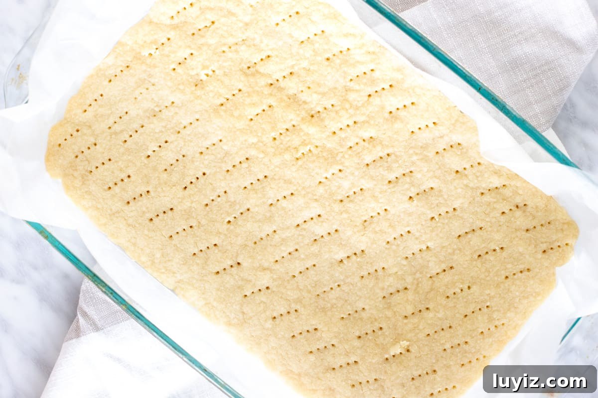 Zesty Lemon Raspberry Dessert Bars — Bright Tart Bar Recipe 4 Shortbread base for lemon raspberry bars