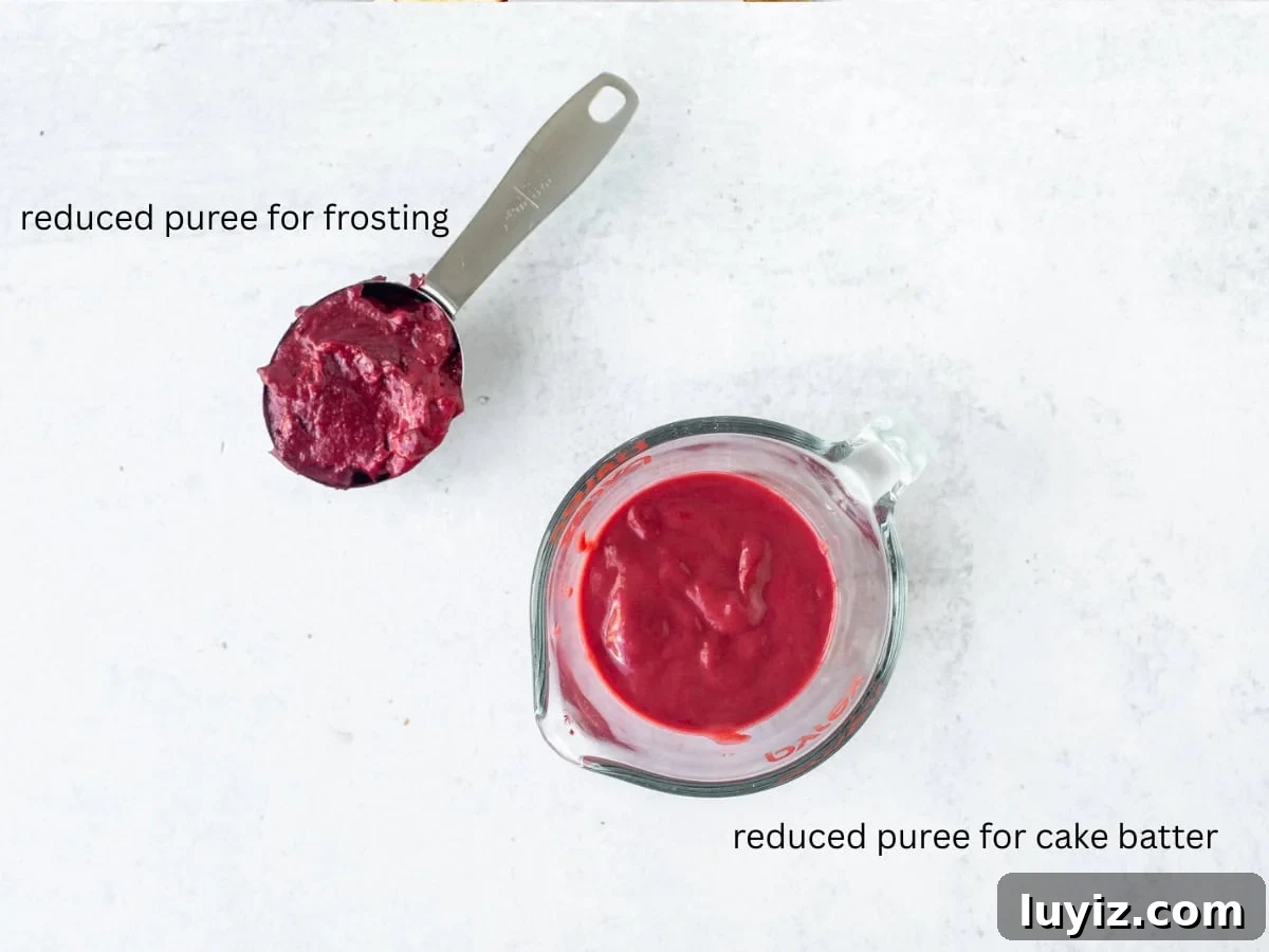 Moist Strawberry Layer Cake Recipe with Fresh Berry Frosting 4 measuring cup with reduced strawberry puree for strawberry frosting, and liquid measuring cup with reduced strawberry puree for cake batter
