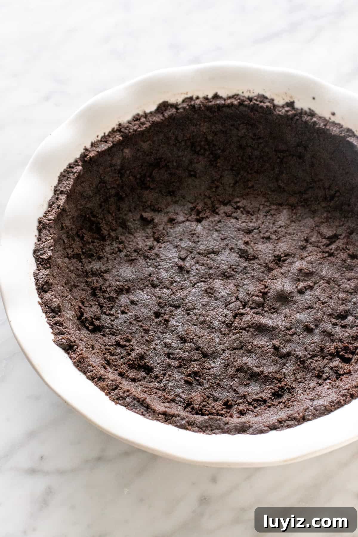 Irresistible Oreo Chocolate Pie Recipe: Creamy No-Bake Dessert 4 Oreo cookie pie crust.