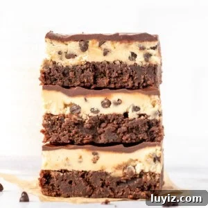 Cookie Dough Brownies Recipe: Chewy Brownies with Edible Cookie Dough Topping 10 Three cookie dough brownies, stacked one on top of another