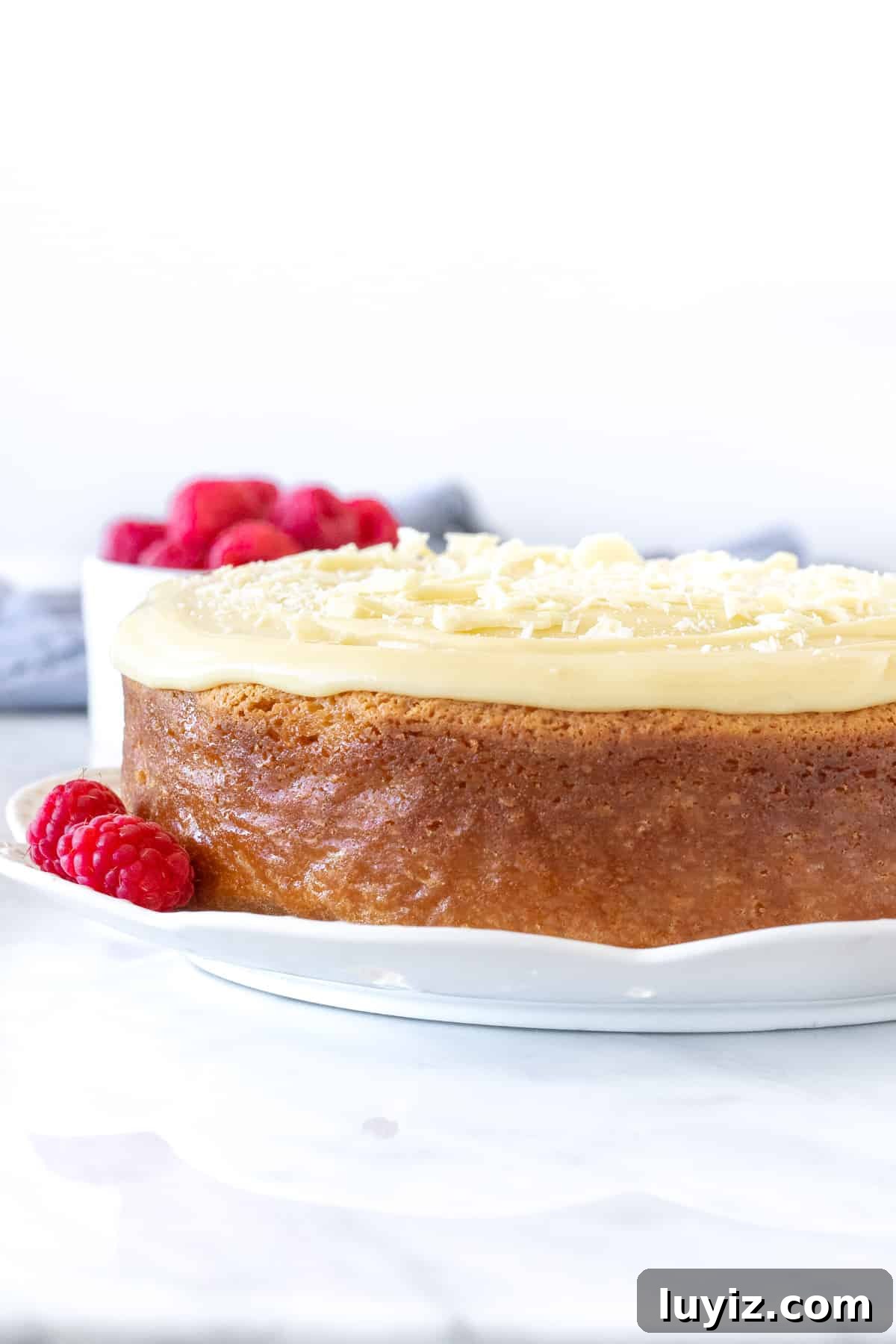 Decadent White Chocolate Mud Cake Recipe 2 Round white chocolate mud cake with white chocolate ganache on top