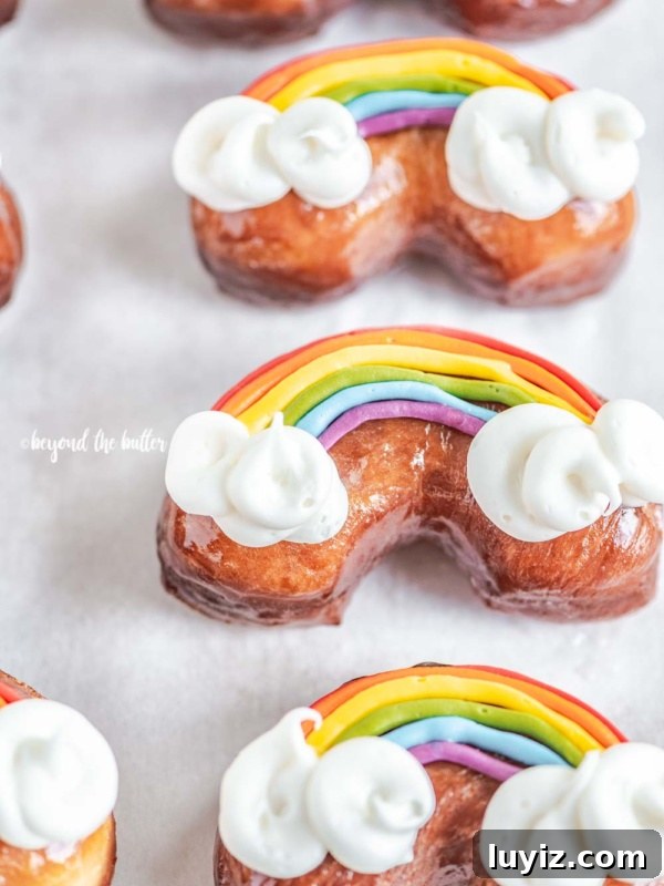 DIY Gingerbread Houses: Step-by-Step Guide for Festive Creations 10 Overhead image of homemade Rainbow Donuts.