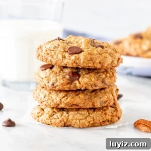 Chewy Cowboy Cookie Recipe with Oats, Chocolate & Pecans 6 4 cowboy cookies stacked one of top of eachother