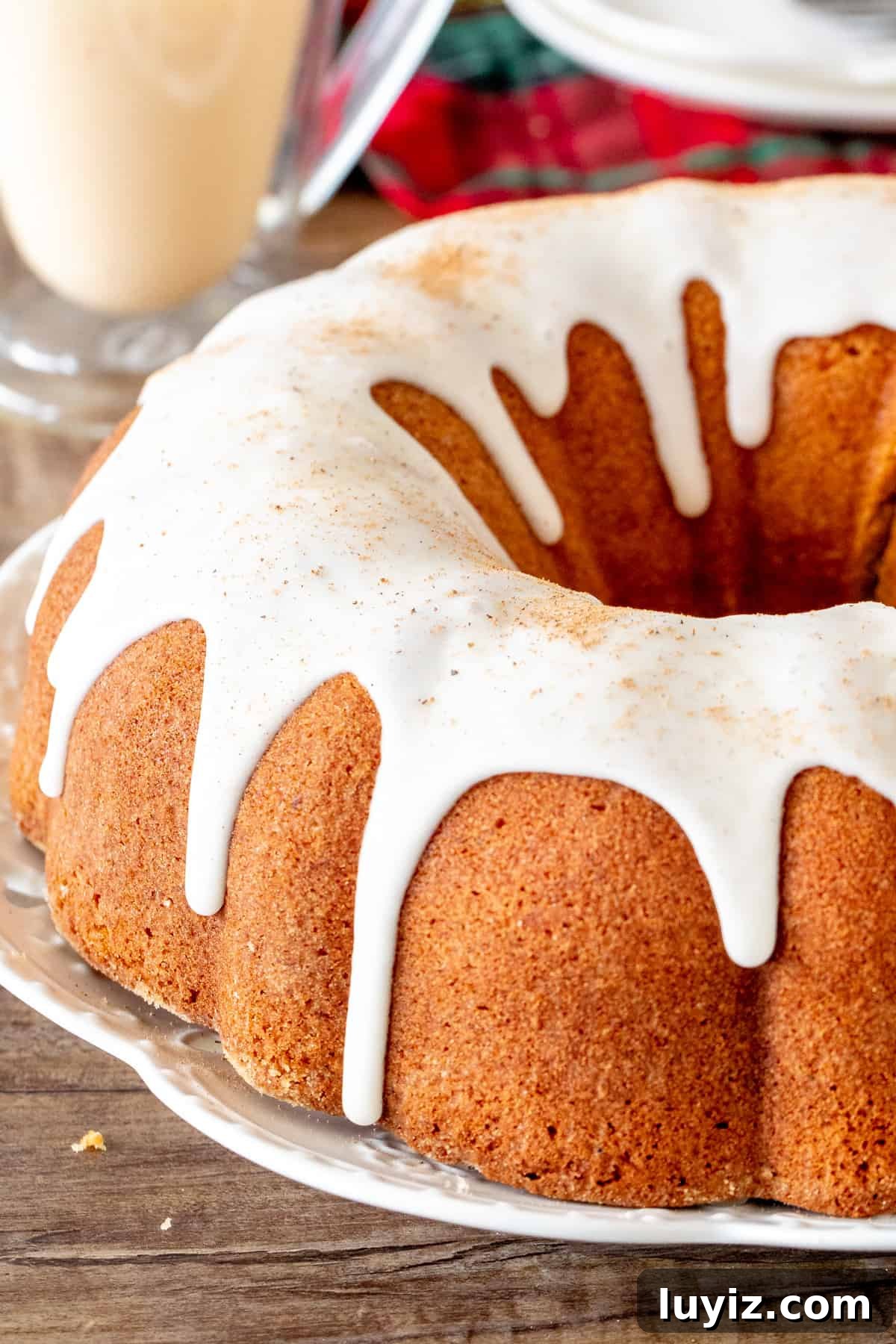 Moist Eggnog Bundt Cake Recipe Perfect for Christmas 2 Eggnog bundt cake drizzled with glaze