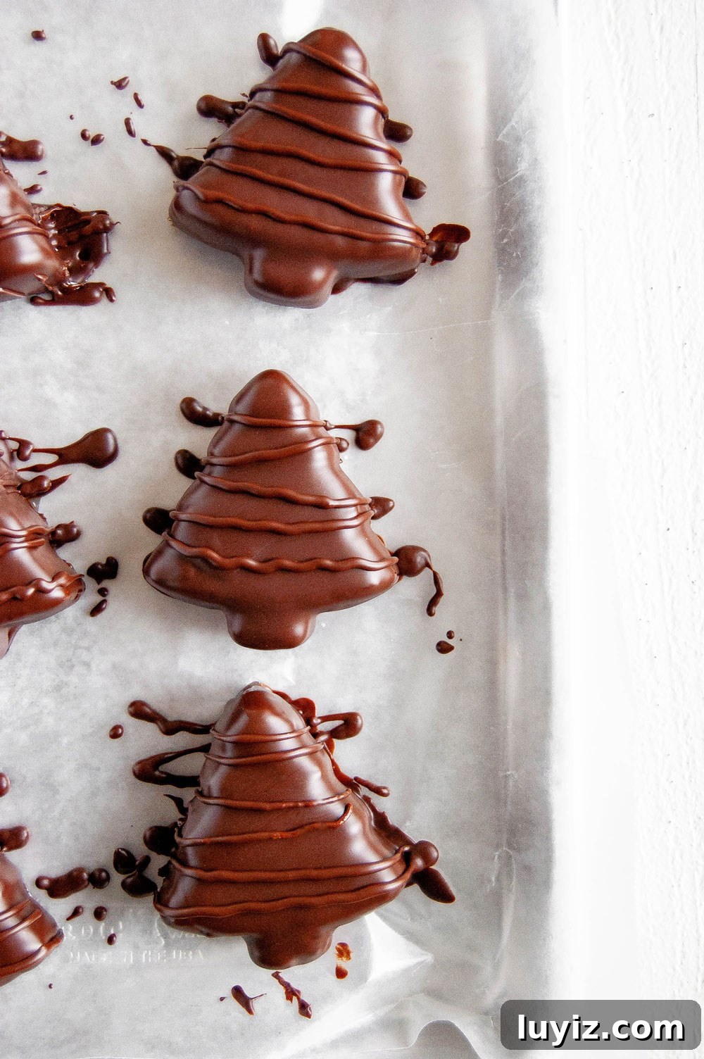 Chocolate-Covered Peanut Butter Christmas Tree Treats 5 Chocolate Covered Peanut Butter Christmas Trees | All Images © Beyond the Butter, LLC