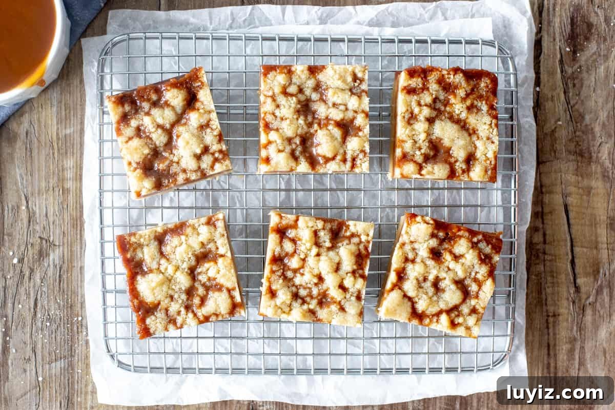 Salted Caramel Crumb Bars with Buttery Shortbread 3 6 caramel butter bars on a cooling rack