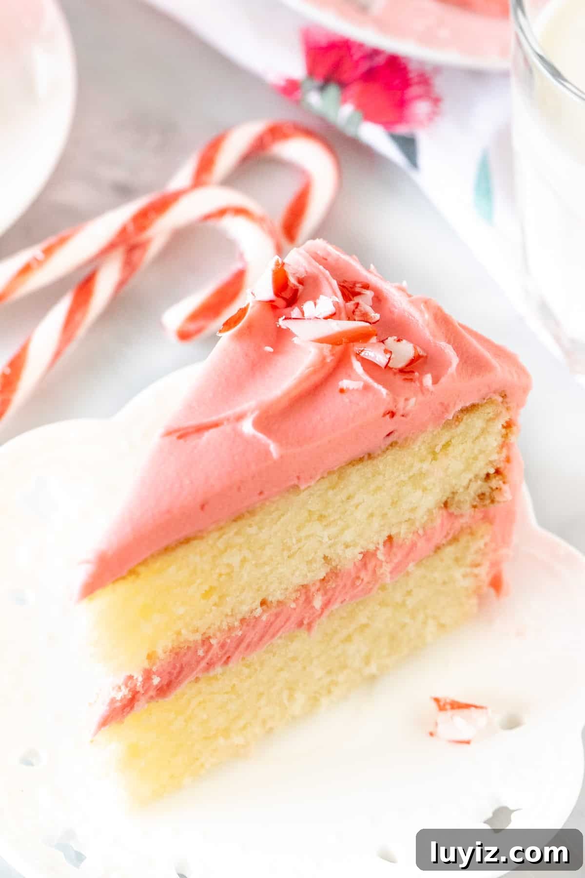 Candy Cane Cake with White Chocolate Peppermint Frosting 3 Slice of candy cane layer cake with white chocolate peppermint frosting
