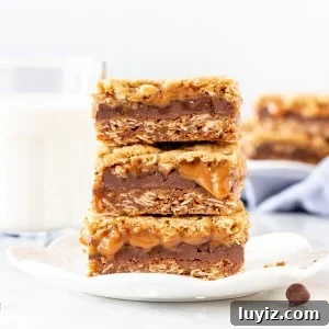 Caramelitas: Chewy Caramel Oatmeal Bars Recipe 7 Stack of 3 Caramelitas on a plate