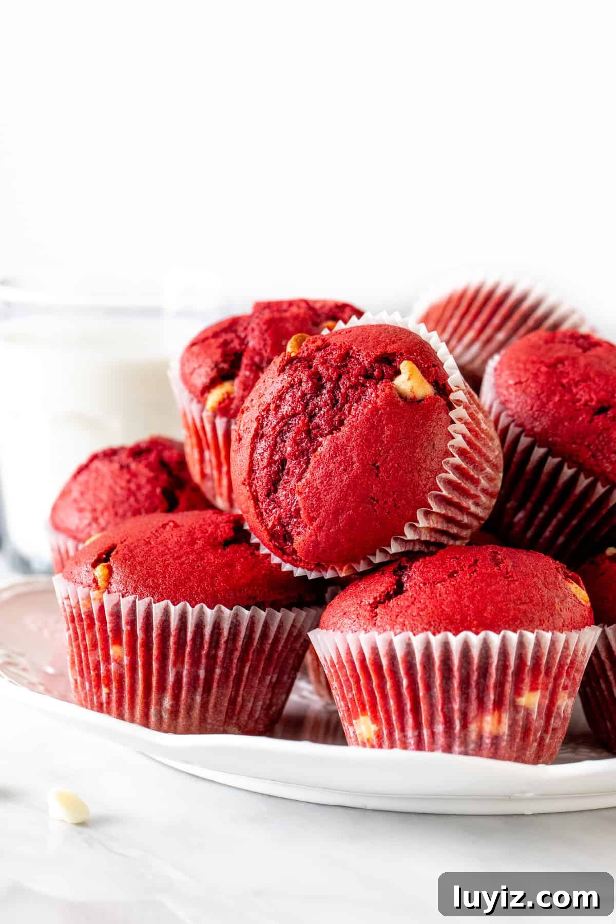Red Velvet Muffins Stuffed with Melting Chocolate Chips 2 Plate of red velvet muffins