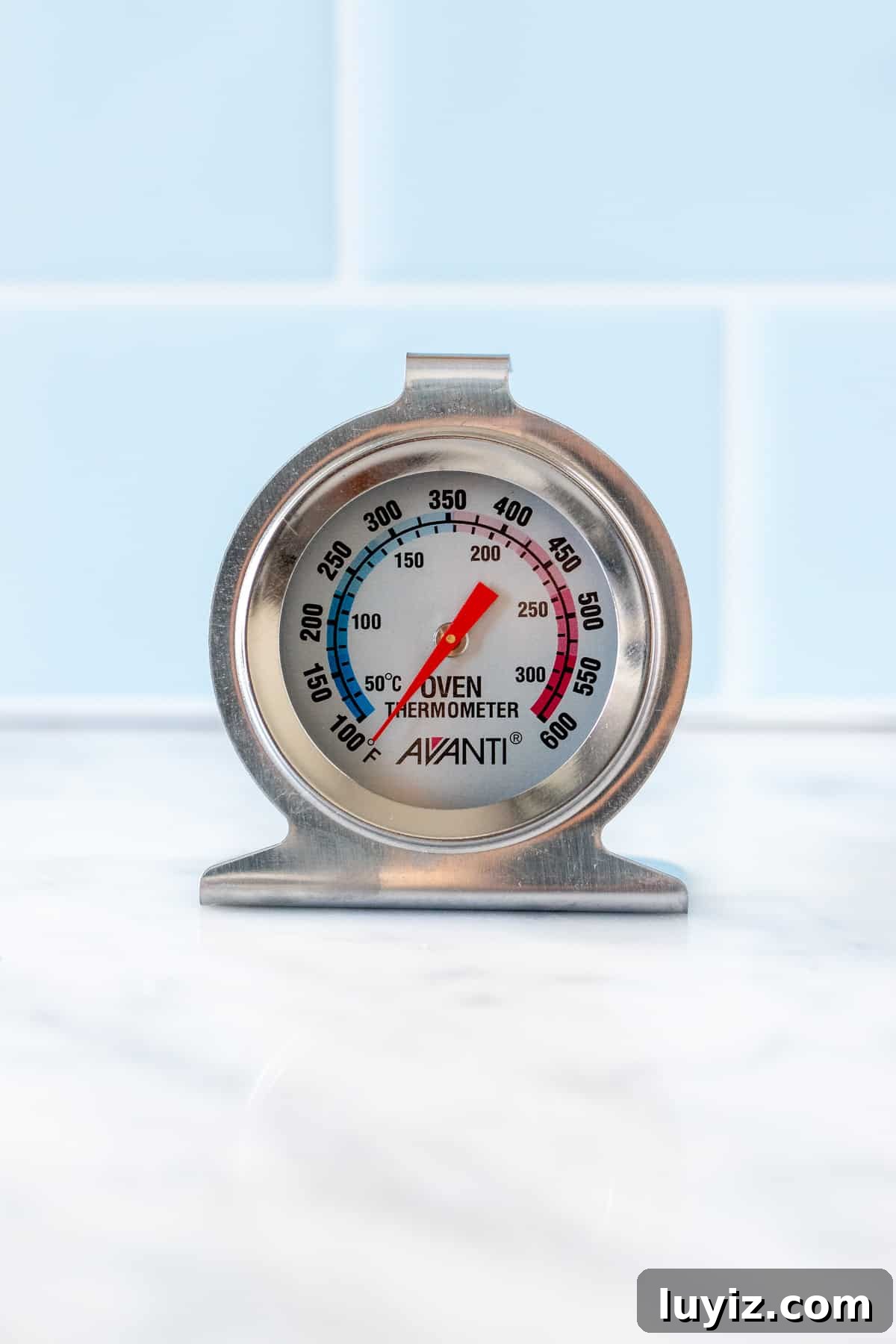 Baking Tips That Improve Your Skills Fast 6 An oven thermometer on a kitchen counter