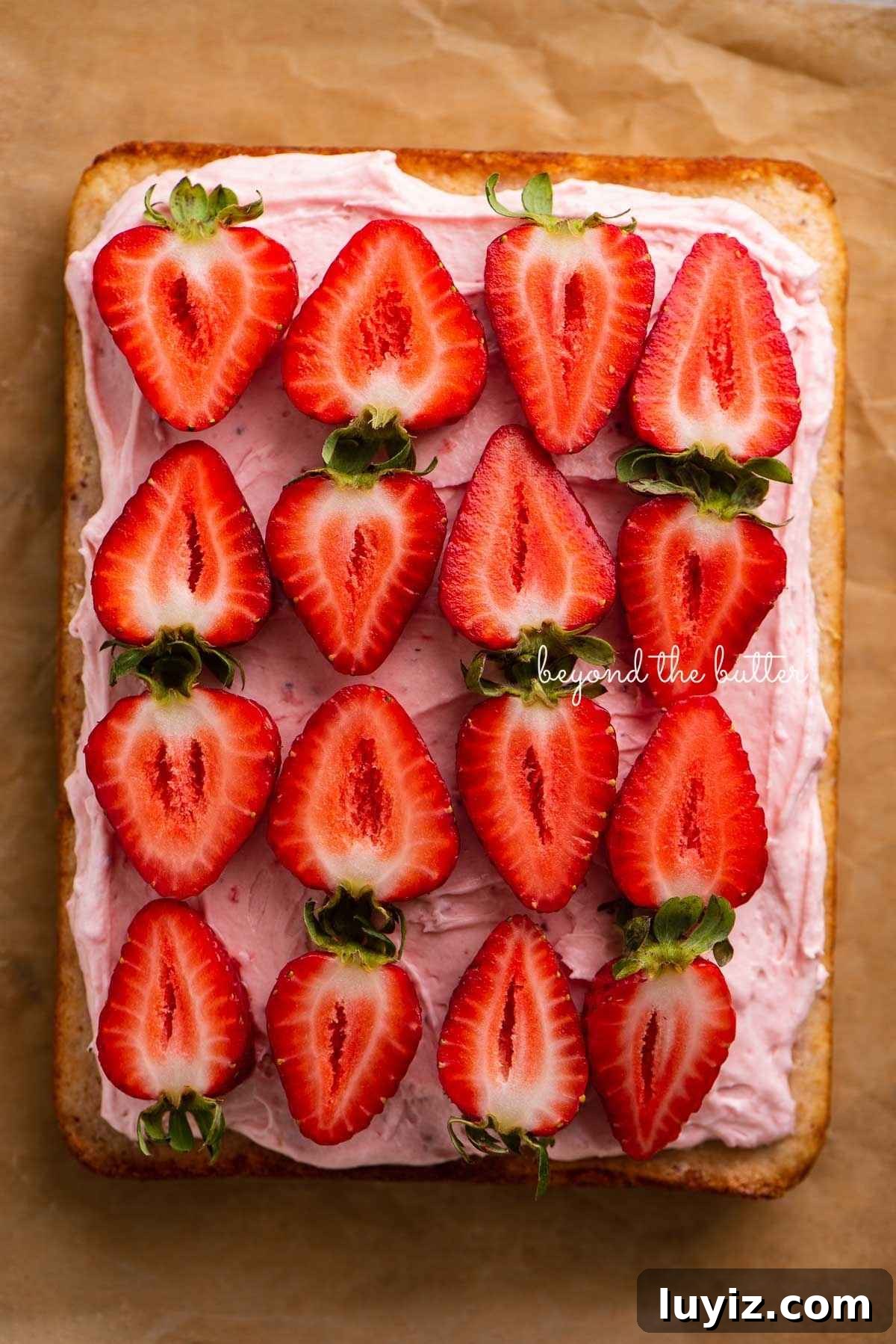 Mini Strawberry Sheet Cake Recipe: Quick Moist Fresh Strawberry Cake 20 Mini strawberry sheet cake topped with strawberry buttercream frosting on parchment paper.