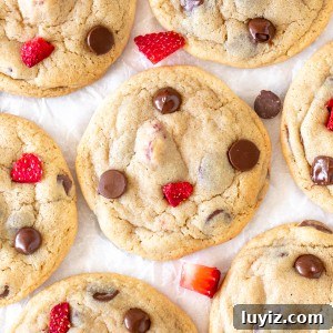 Strawberry and Chocolate Chip Cookie Recipe for Summer Baking 5 Strawberry chocolate chip cookies on baking paper