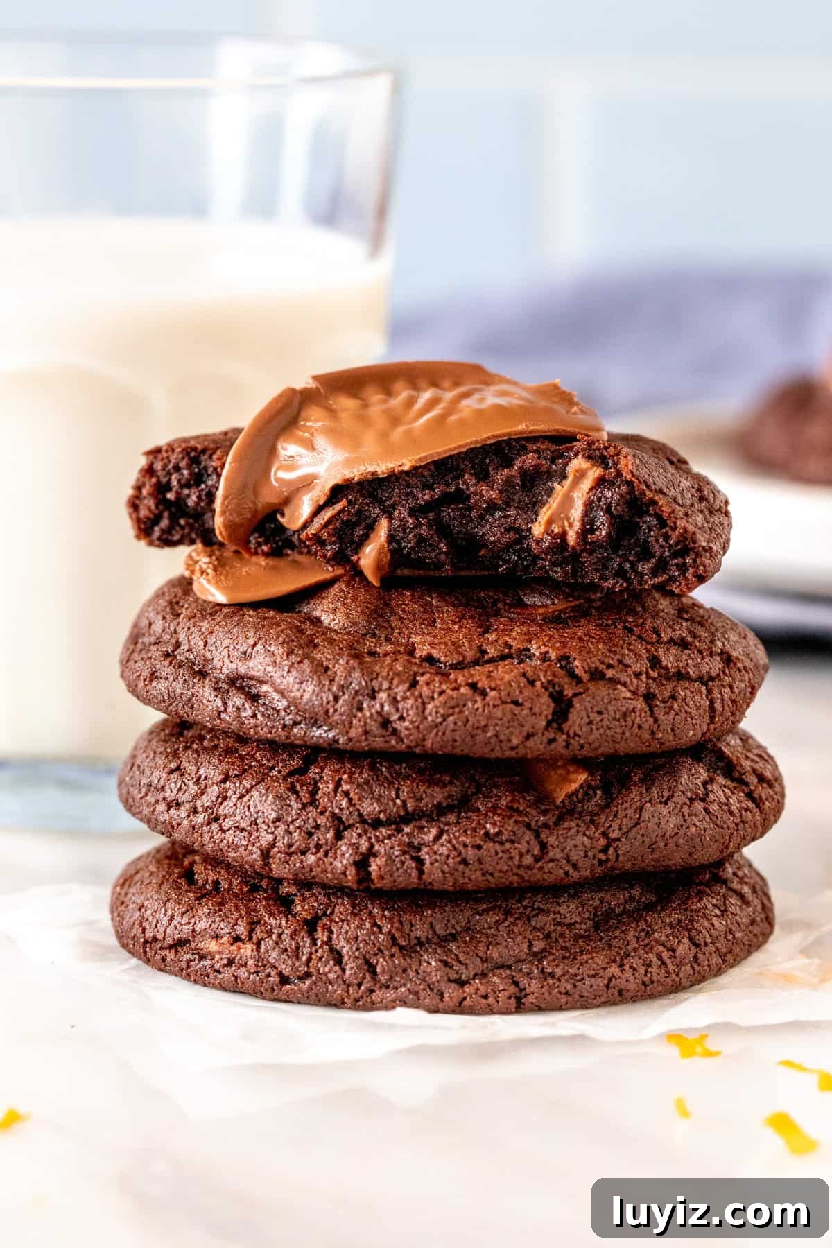 Decadent Chocolate Orange Cookies Recipe for Zesty Treats 4 Stack of 4 Terry's chocolate orange cookies, with the top cookie broken in half