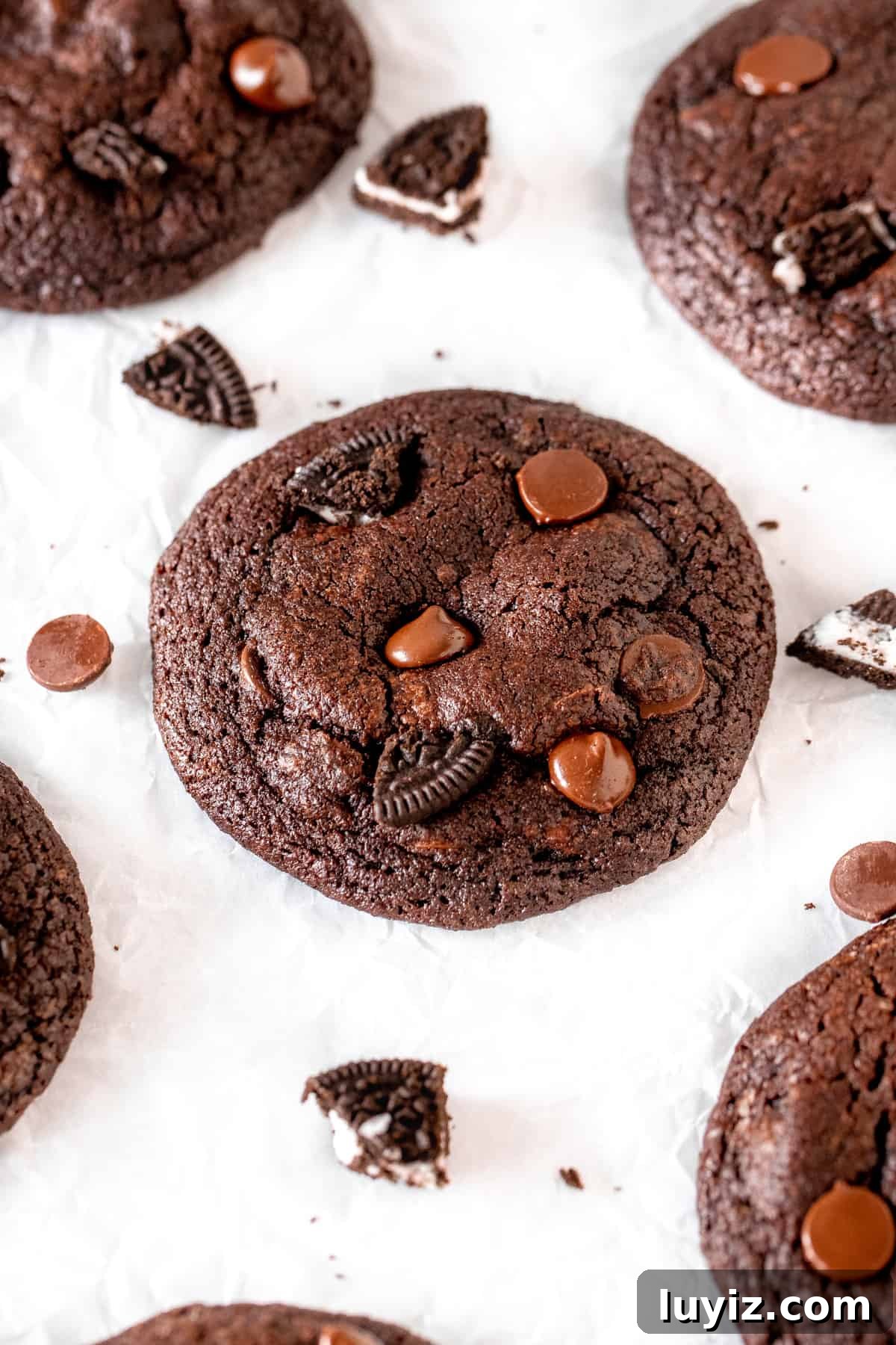 Chocolate Oreo Cookie Recipe: Crispy, Creamy Homemade Treats 2 Chocolate Oreo cookies on baking paper