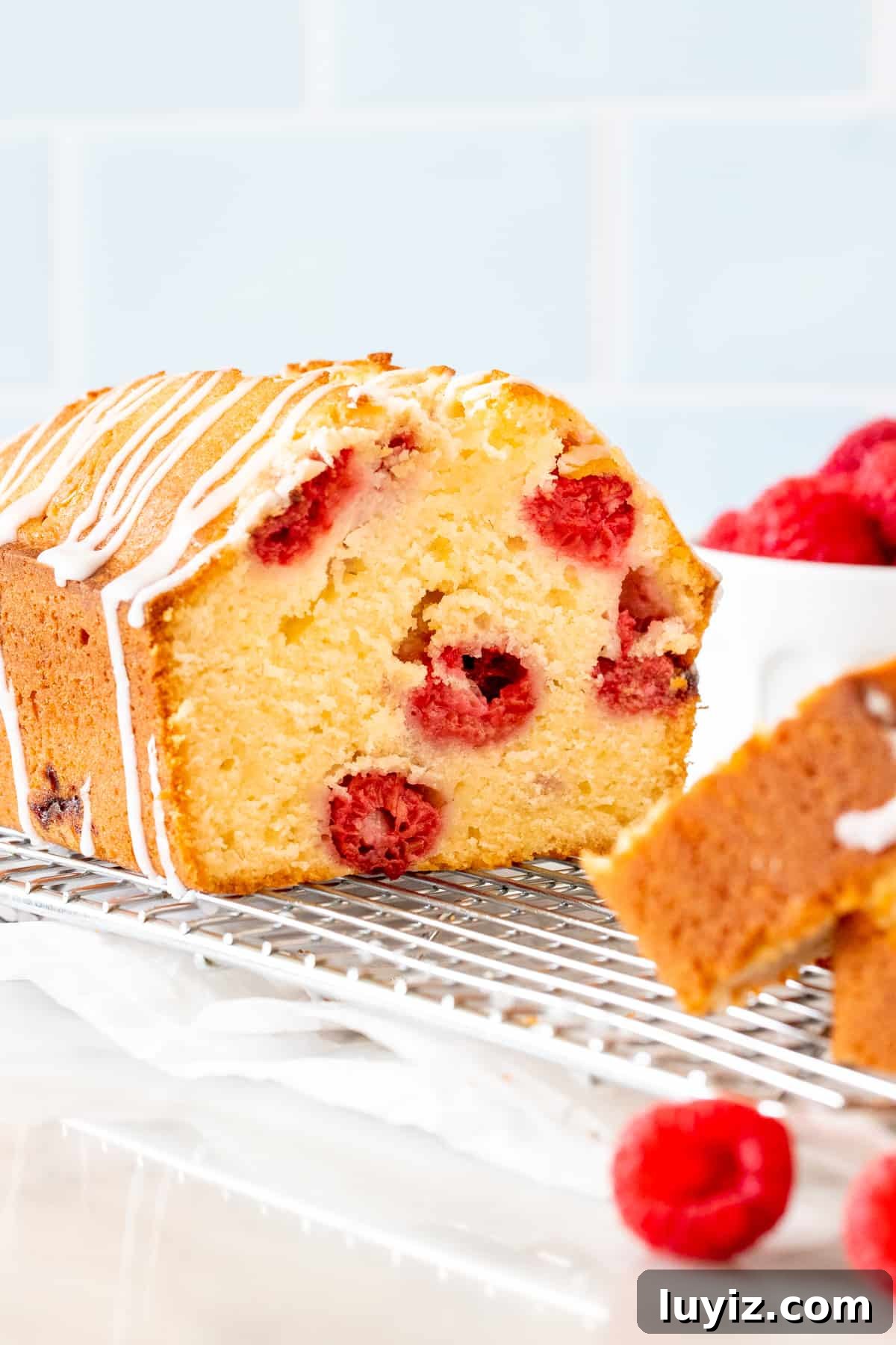 Moist Raspberry Bread Packed with Fresh Berries 5 Half of a loaf of raspberry muffin bread