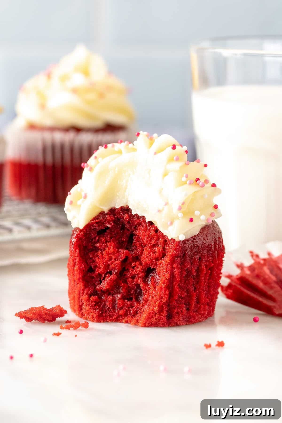 Red Velvet Cupcakes for Small Batches: Perfect Mini Recipe 6 Red velvet cupcake with cream cheese frosting with bite taken out