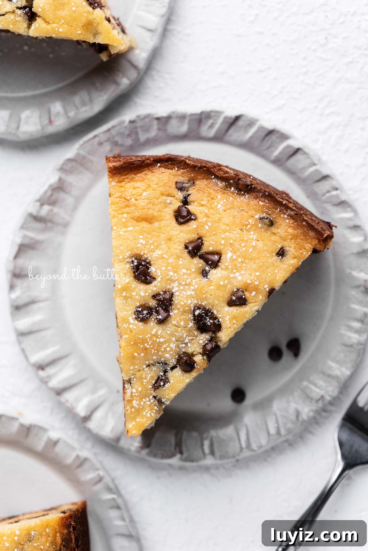 Moist Chocolate Chip Ricotta Cake Recipe for Perfect Dessert 7 Individual slices of chocolate chip ricotta cake on handmade ceramic plates | © Beyond the Butter®
