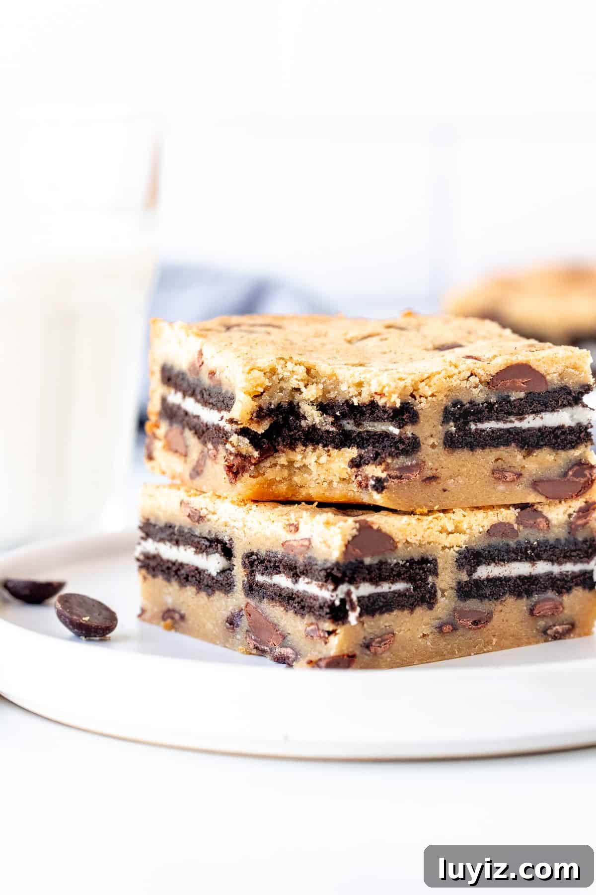 Oreo-Stuffed Chocolate Chip Cookie Bars Recipe 6 2 oreo chocolate chip blondies with glass of milk