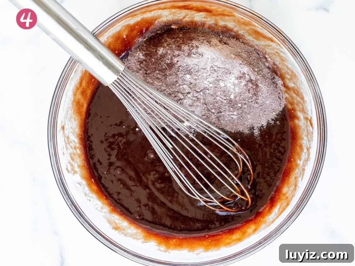 Decadent Kit Kat Chocolate Brownies Recipe 4 Bowl of brownie batter, before flour and cocoa are whisked in