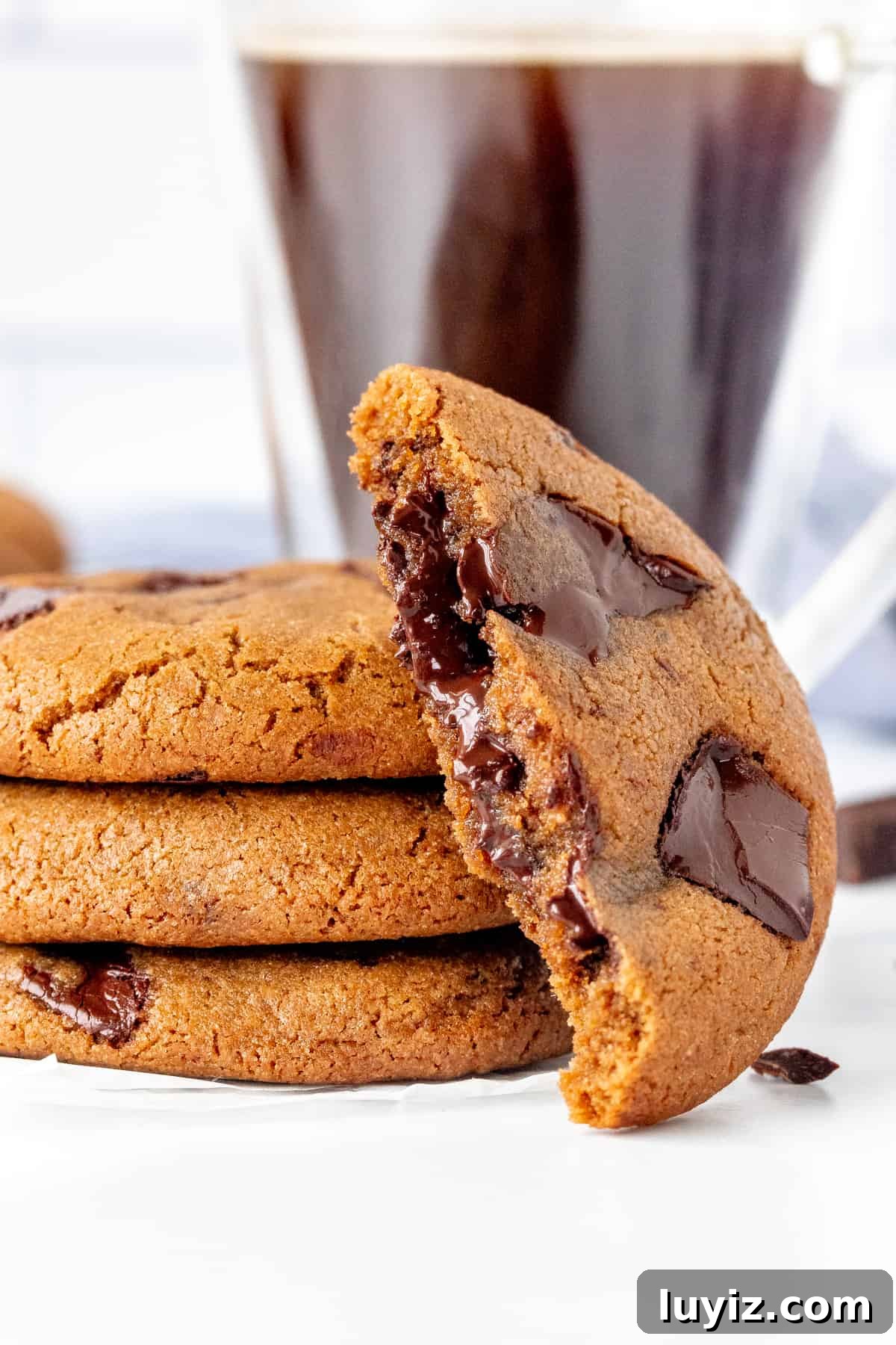 Espresso Chocolate Chip Cookie Recipe for Rich, Chewy Cookies 2 Stack of 3 espresso chocolate chunk cookies w/ half a cookie on its side