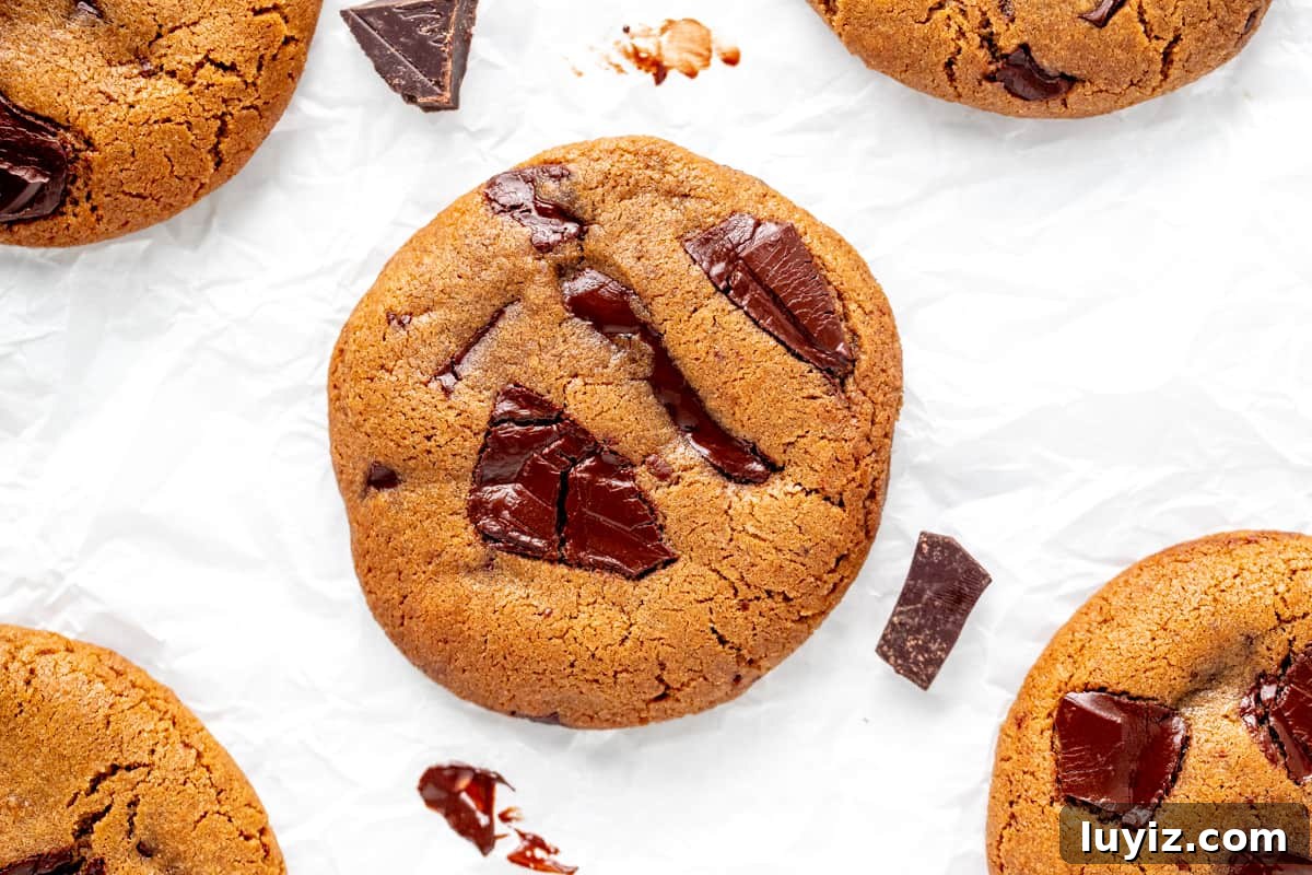 Espresso Chocolate Chip Cookie Recipe for Rich, Chewy Cookies 3 Espresso chocolate chip cookies on baking paper