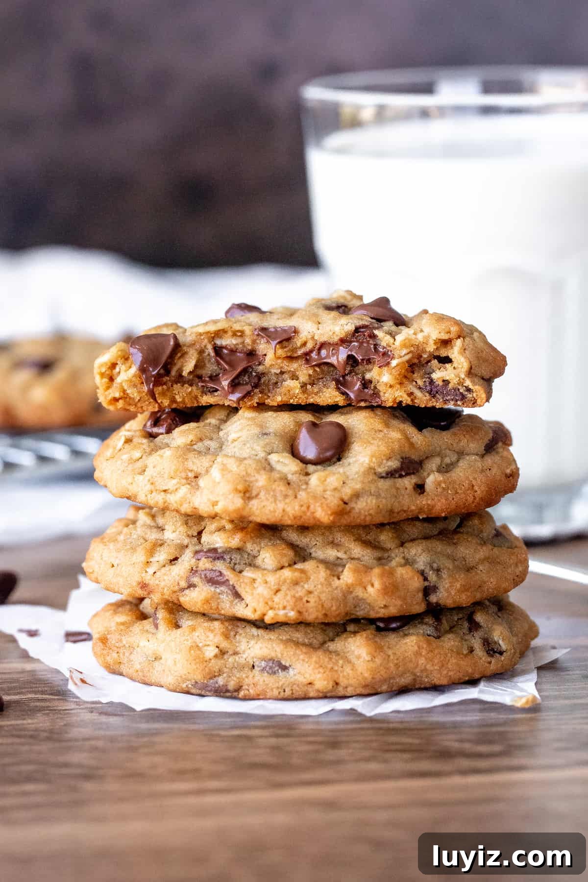 Peanut Butter Oatmeal Chocolate Chip Cookies Recipe You’ll Love 2 Stack of peanut butter oatmeal chocolate chip cookies with top cookie broken in half