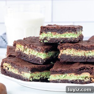 Mint Aero Chocolate Brownies Recipe — Fudgy Mint Cocoa Squares 7 Plate of brownies with mint layer in the middle