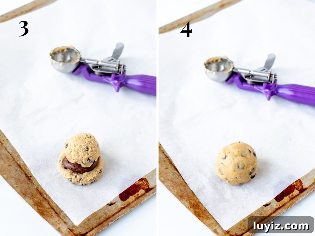 Decadent Nutella-Filled Chocolate Chip Cookies 5 Stuffing cookie dough ball with spoonful of Nutella