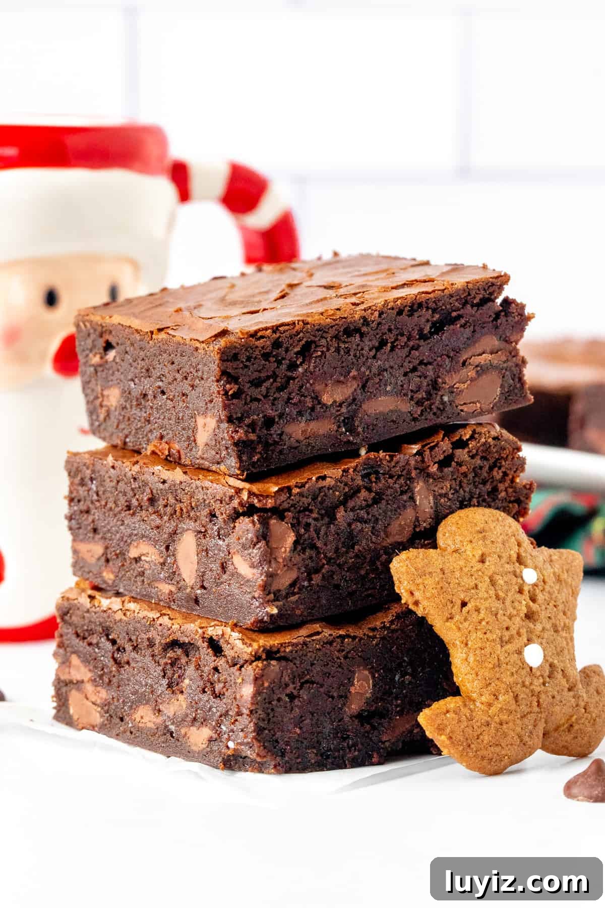 Gingerbread Brownies Recipe: Fudgy Spiced Chocolate Treat 9 Three gingerbread brownies, one on top of each other