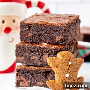 Gingerbread Brownies Recipe: Fudgy Spiced Chocolate Treat 10 Three gingerbread brownies, one on top of each other