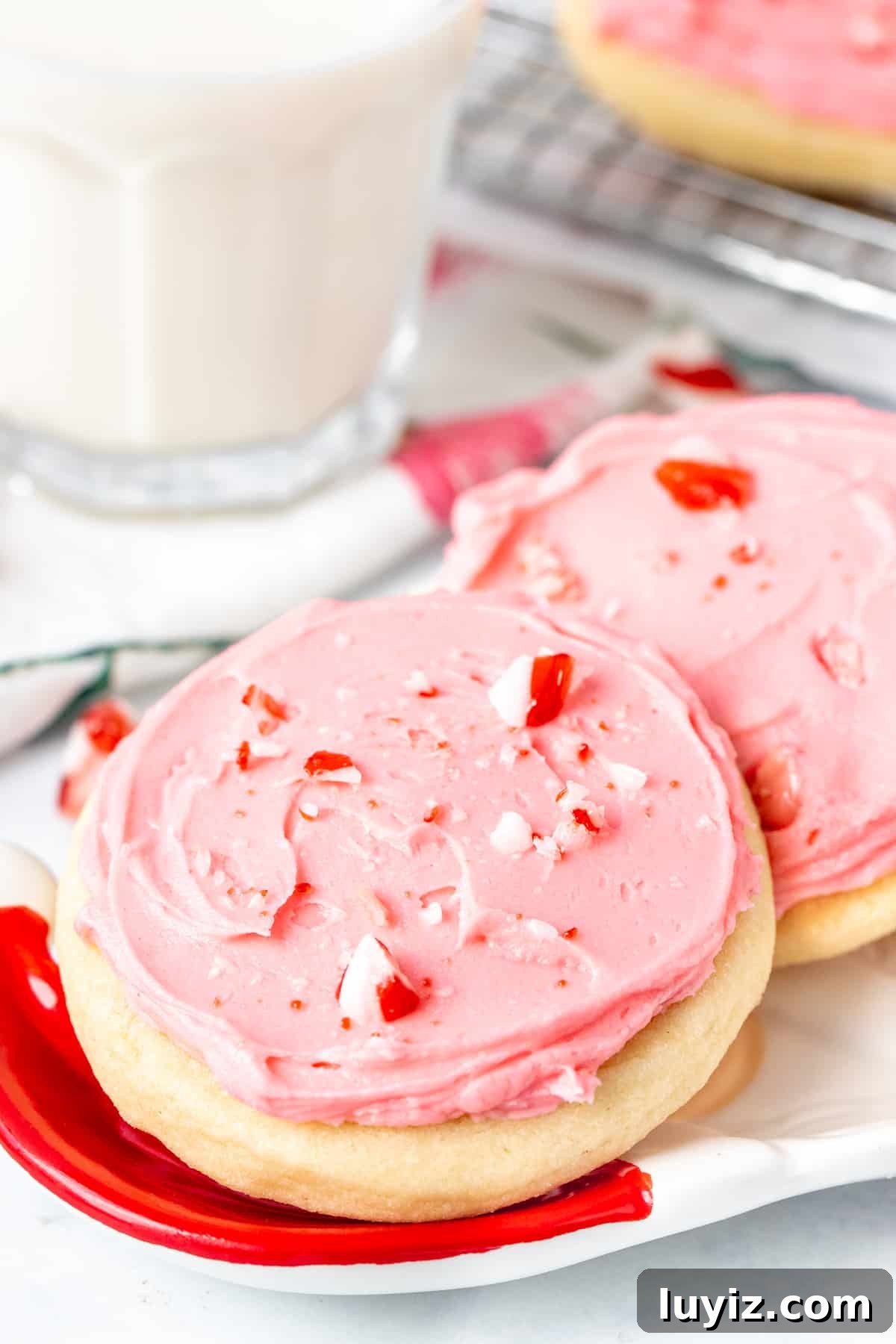 Peppermint Sugar Cookie Recipe: Crisp, Minty Holiday Cookies 2 Plate of peppermint sugar cookies with glass of milk