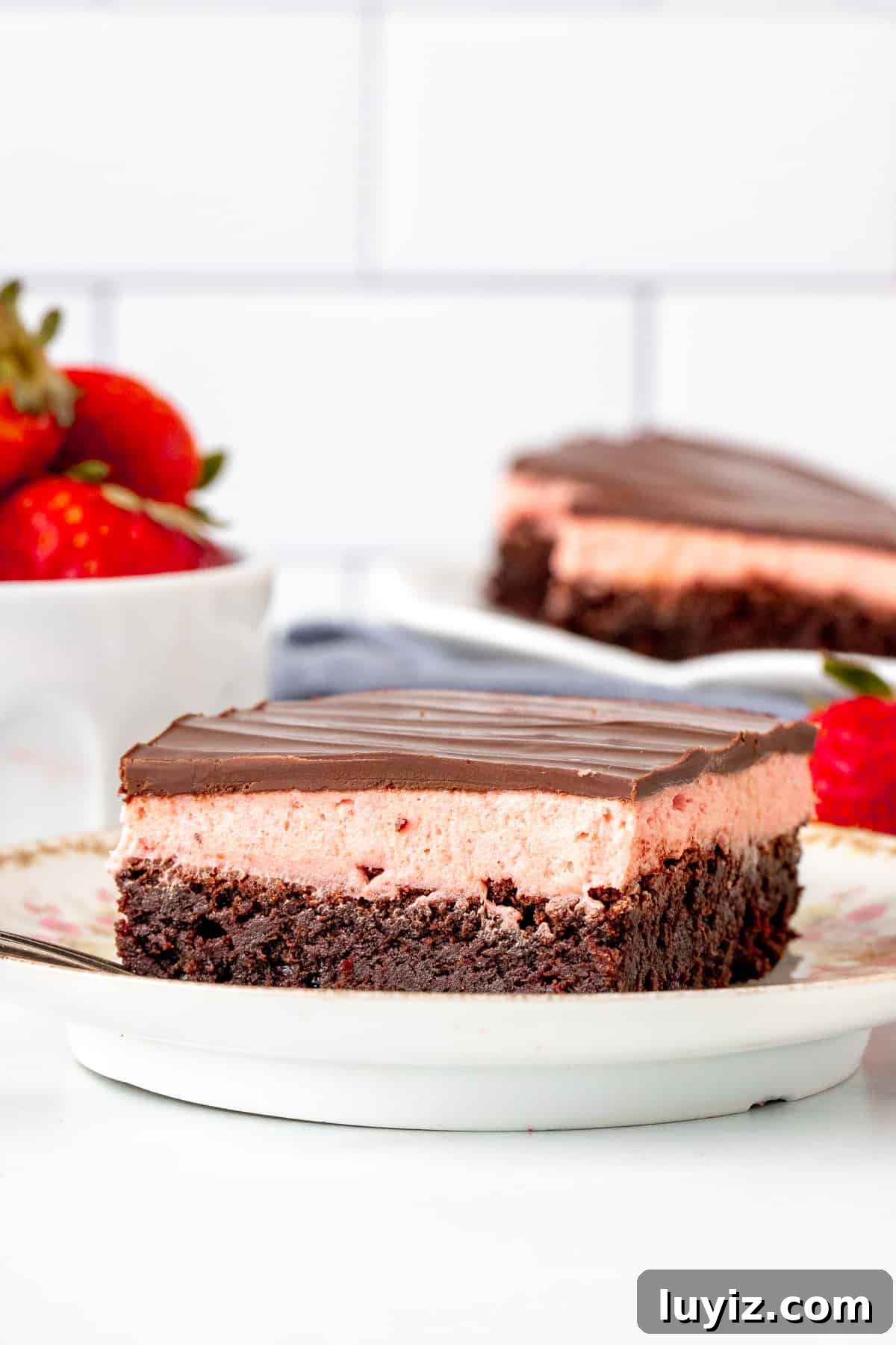 Strawberry Truffle Brownies Recipe — Decadent Chocolate-Strawberry Treat 4 Brownie with a layer of strawberry frosting and chocolate topping