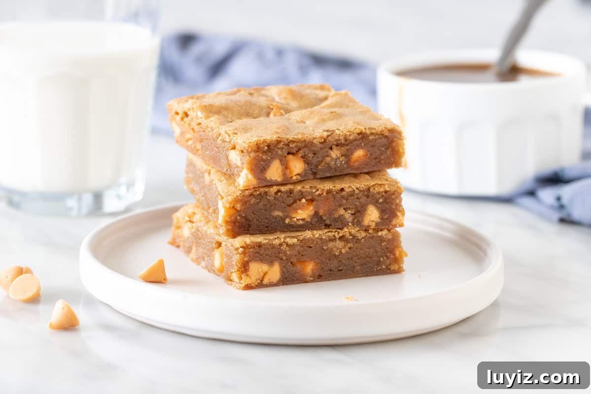 Chewy Butterscotch Blondies Recipe for Rich, Gooey Bars 4 Stack of 3 blondies made with butterscotch chips.