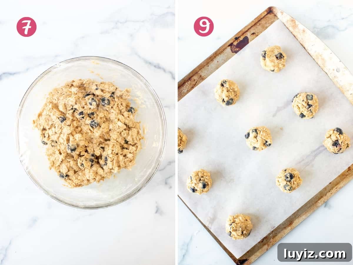 Chewy Blueberry Oatmeal Cookies Recipe for Breakfast & Snacks 7 Bowl of blueberry oatmeal cookie dough and blueberry oatmeal cookie dough balls on lined cookie sheet
