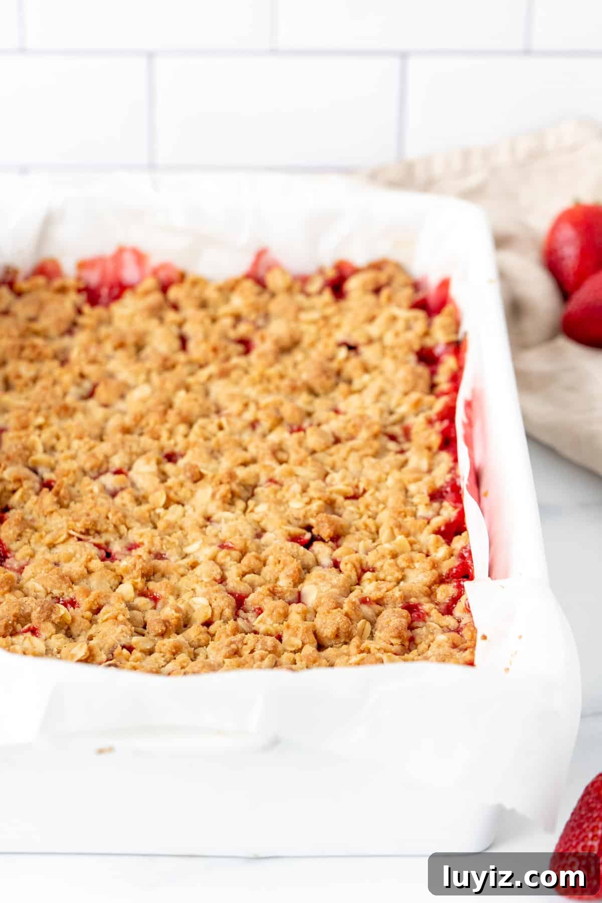 Strawberry Rhubarb Dessert Bars with Oat Crumble 5 Pan of strawberry rhubarb crumble bars
