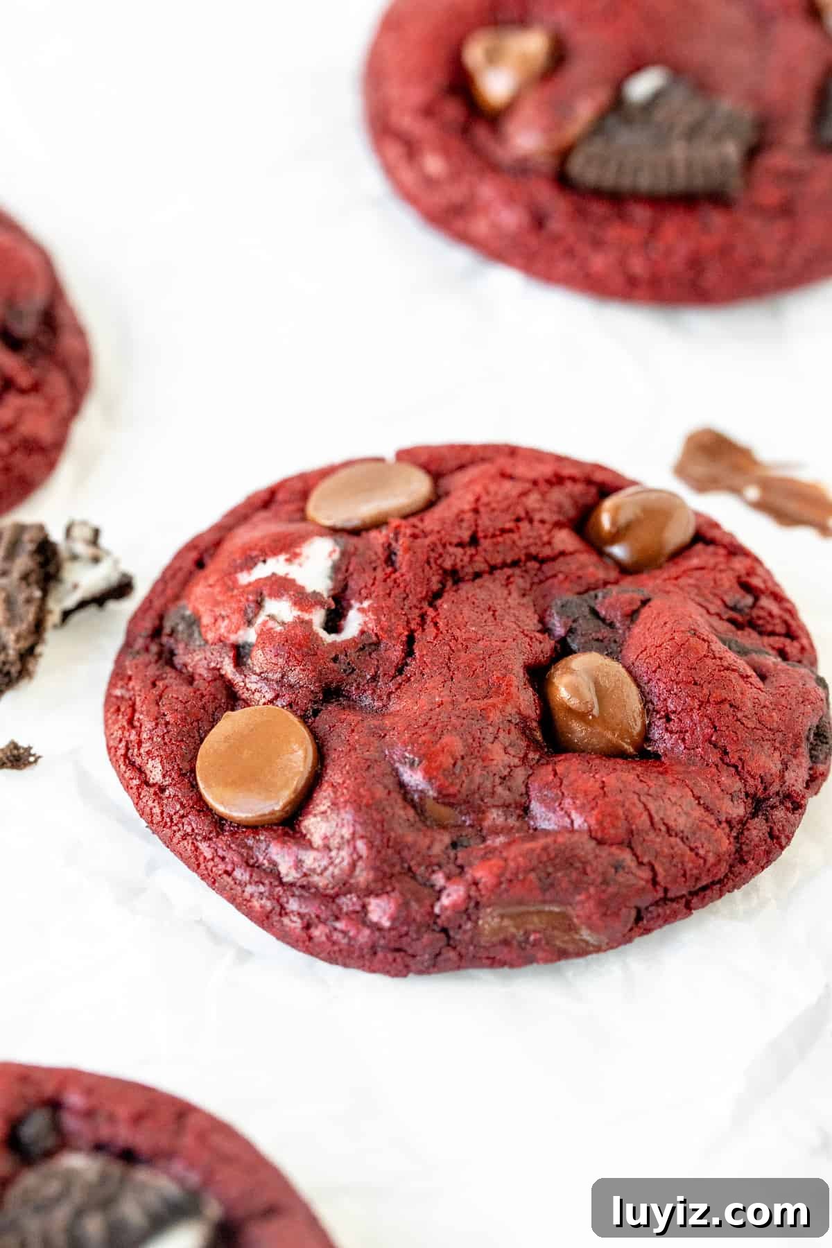 Oreo Red Velvet Cookie Recipe: Cream Cheese Frosting Twist 6 Homemade Oreo red velvet cookie on baking sheet.