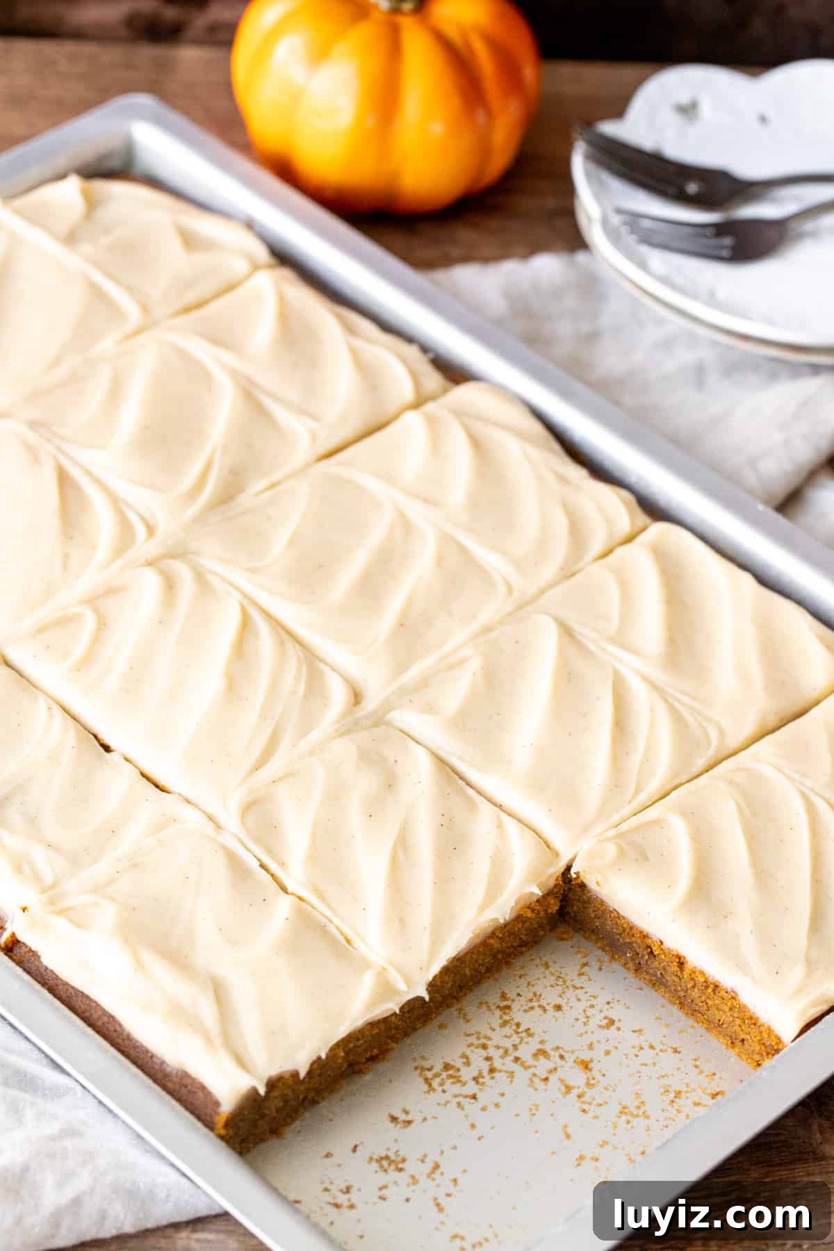 Pumpkin Bars with Cinnamon Cream Cheese Frosting Recipe 3 Pan of pumpkin bars topped with cream cheese frosting