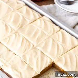 Pumpkin Bars with Cinnamon Cream Cheese Frosting Recipe 7 Pan of pumpkin bars topped with cream cheese frosting