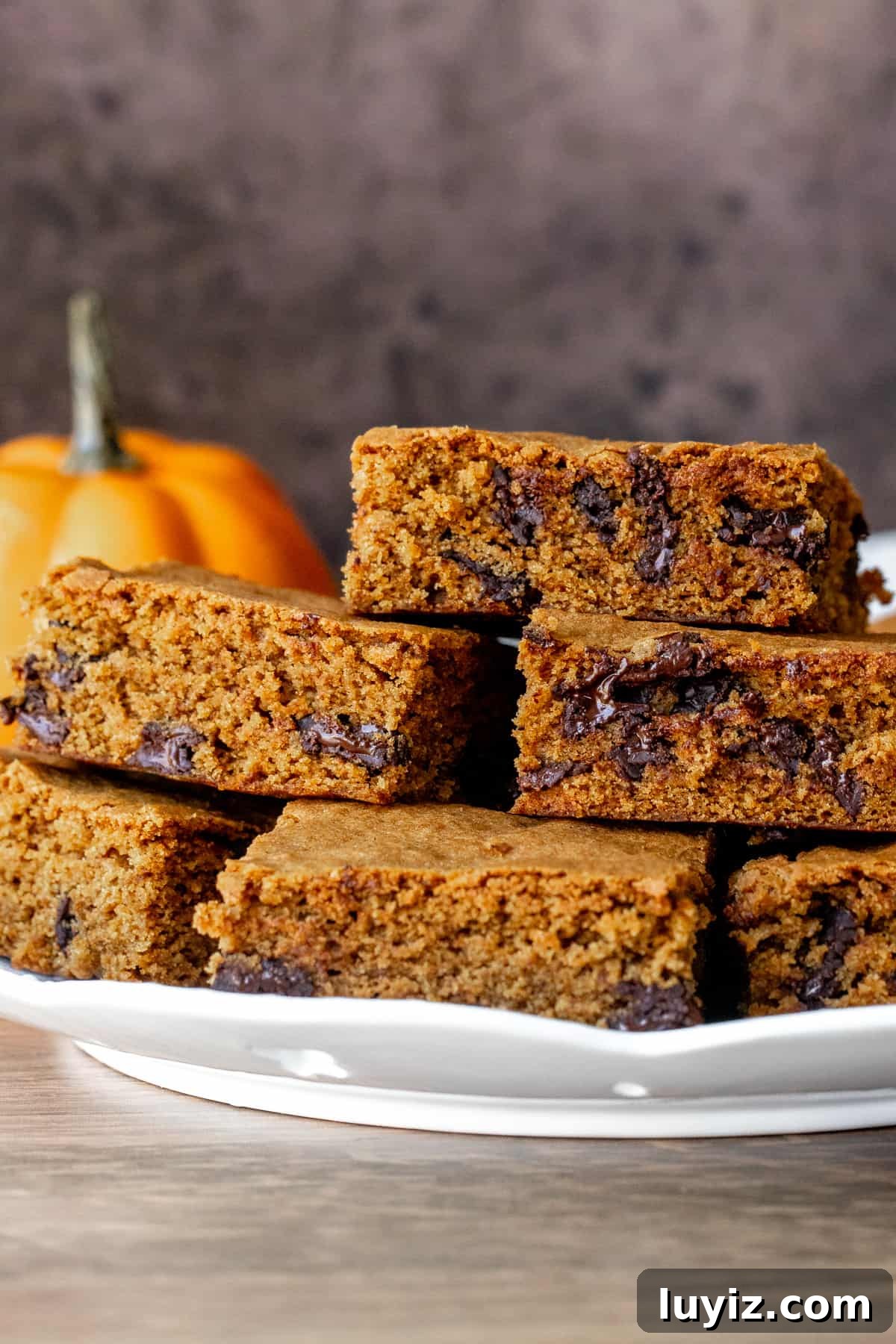 Pumpkin Chocolate Chip Blondies: Soft Fall Dessert Bars 3 Plate of pumpkin chocolate chip bars