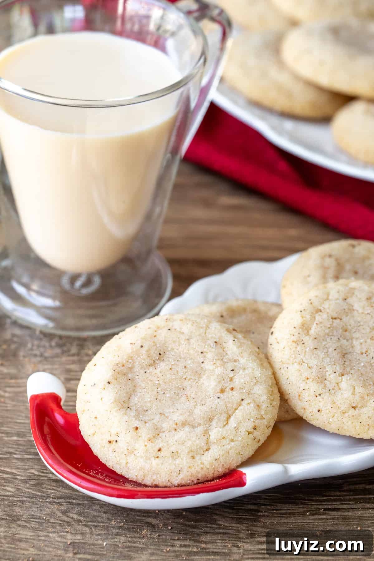 Eggnog Snickerdoodle Cookies: Festive Holiday Cookie Recipe 2 Small Santa plate with eggnog snickerdoodles and glass of eggnog
