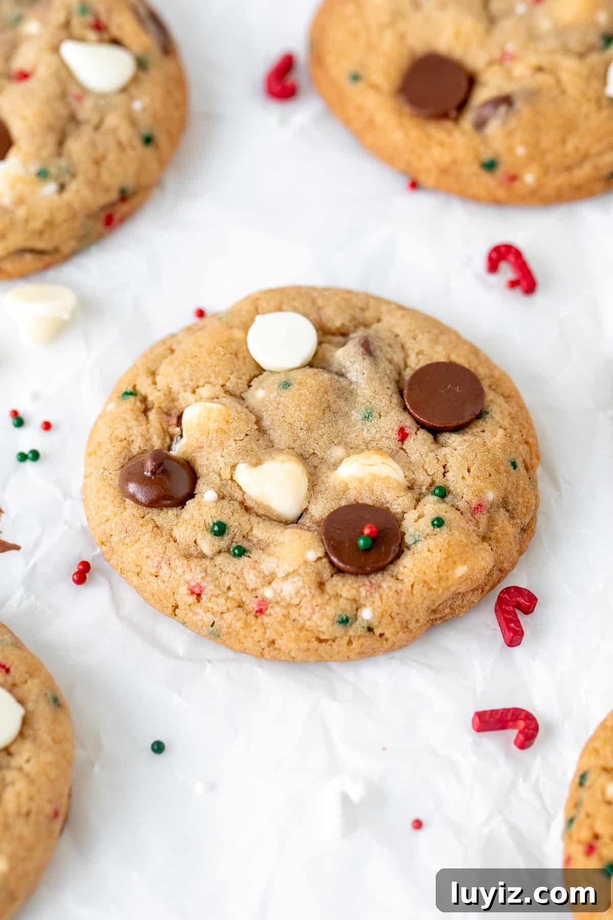 Christmas Chocolate Chip Cookies Recipe: Festive Soft-Baked Treats 8 Chocolate chip cookie with white chocolate chips and chocolate chips and red and green sprinkles