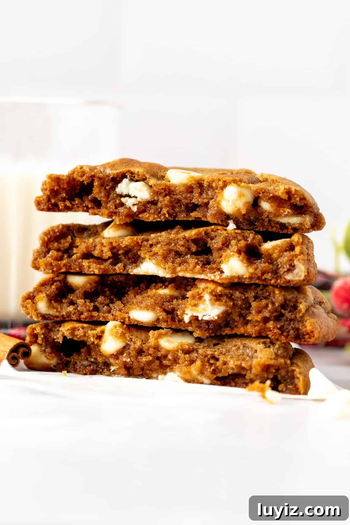 Bakery-Style Gingerbread Cookies with White Chocolate Chips 5 Stack of gingerbread white chocolate chip cookie halves