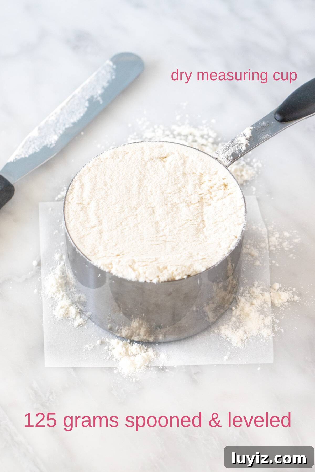 How to Measure Flour Accurately With or Without a Scale 4 1 cup of flour measured in a dry measuring cup