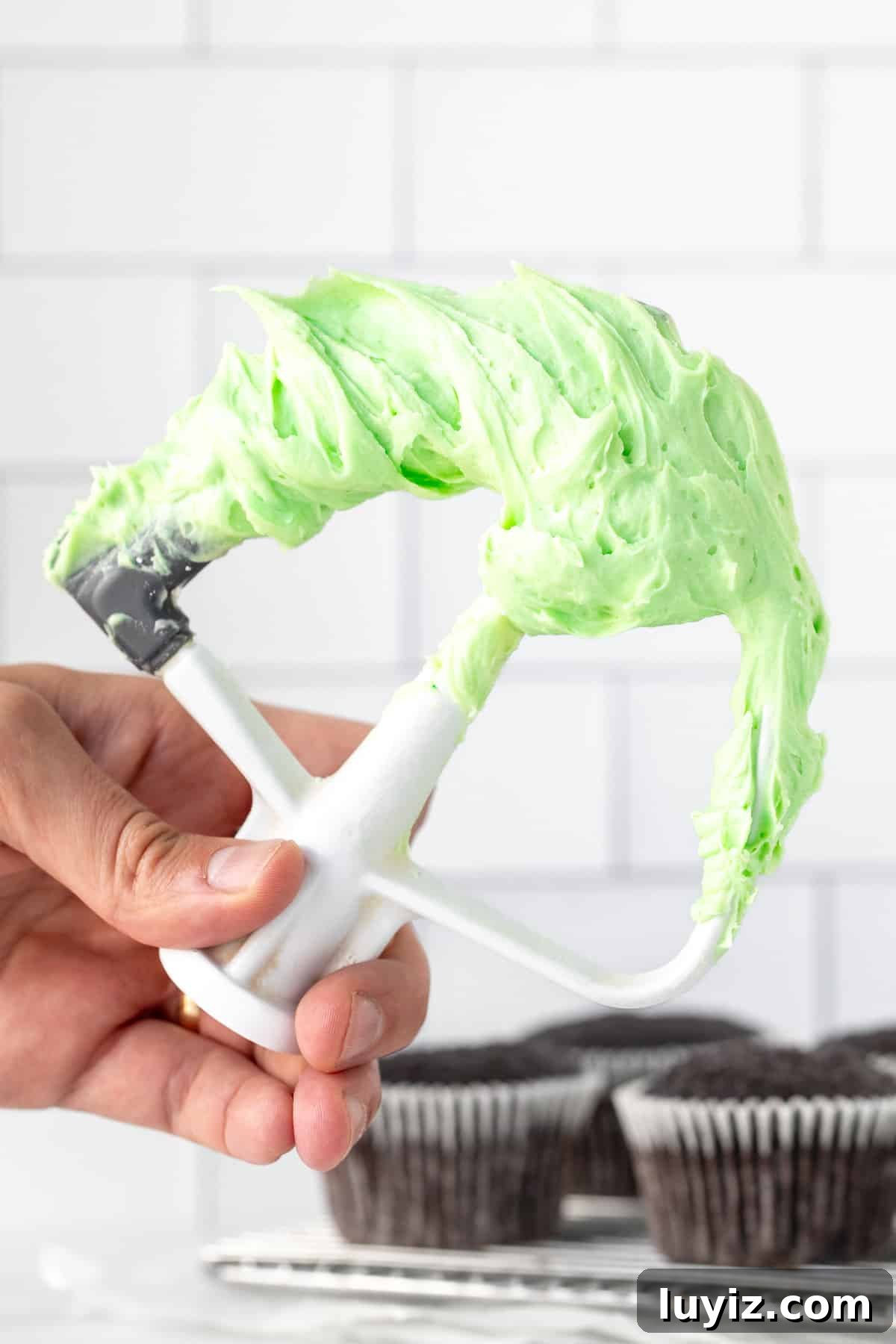Mint Chocolate Cupcakes Recipe — Decadent Mint-Choc Cupcakes 3 Stand mixer beater covered in mint frosting