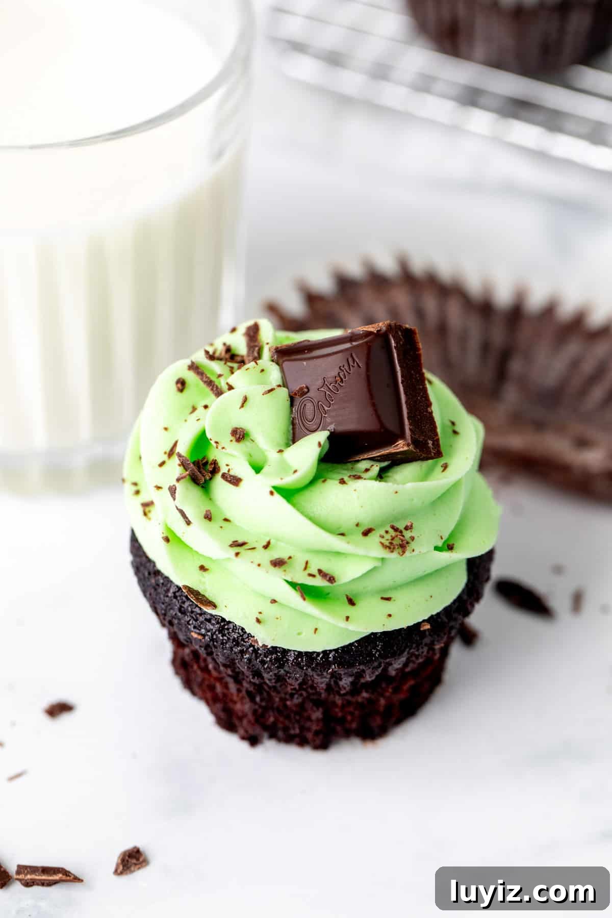 Mint Chocolate Cupcakes Recipe — Decadent Mint-Choc Cupcakes 4 Mint chocolate cupcake with green mint frosting with a glass of milk