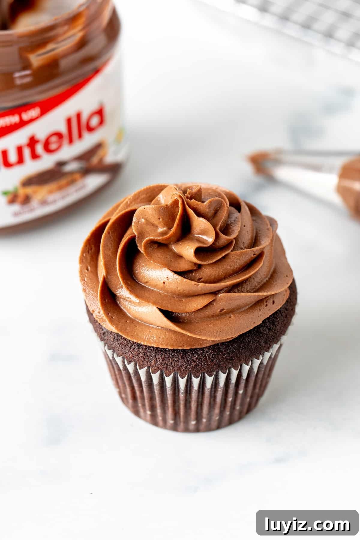Smooth Nutella Frosting Recipe for Cakes and Cupcakes 3 Chocolate cupcake with Nutella frosting