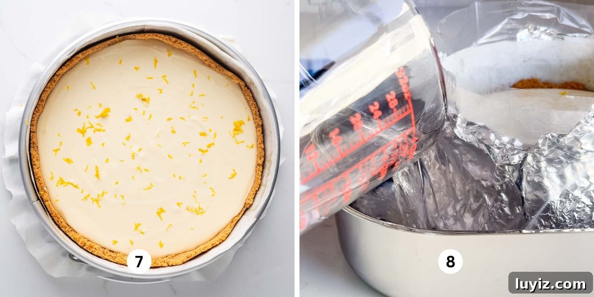 Creamy Lemon Cheesecake Recipe with Zesty Citrus Glaze 11 Pre-baked lemon cheesecake in a springform pan placed in a stainless steel roasting pan with boiling water being poured into the pan for the cheesecake water bath.