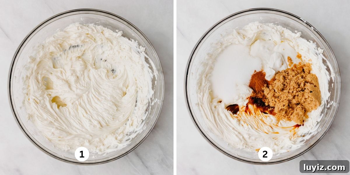 Pecan Pie Cheesecake Recipe — Decadent Homemade Dessert 7 Whipping cream cheese in a glass mixing bowl, then adding in the sugars, sour cream, spices, and vanilla.