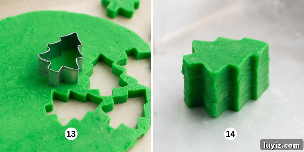 Festive Slice-and-Bake Cookies for Holiday Baking 9 Cutting out the cookie dough Christmas trees and stacking them on top of one another on a wax paper lined cookie sheet.
